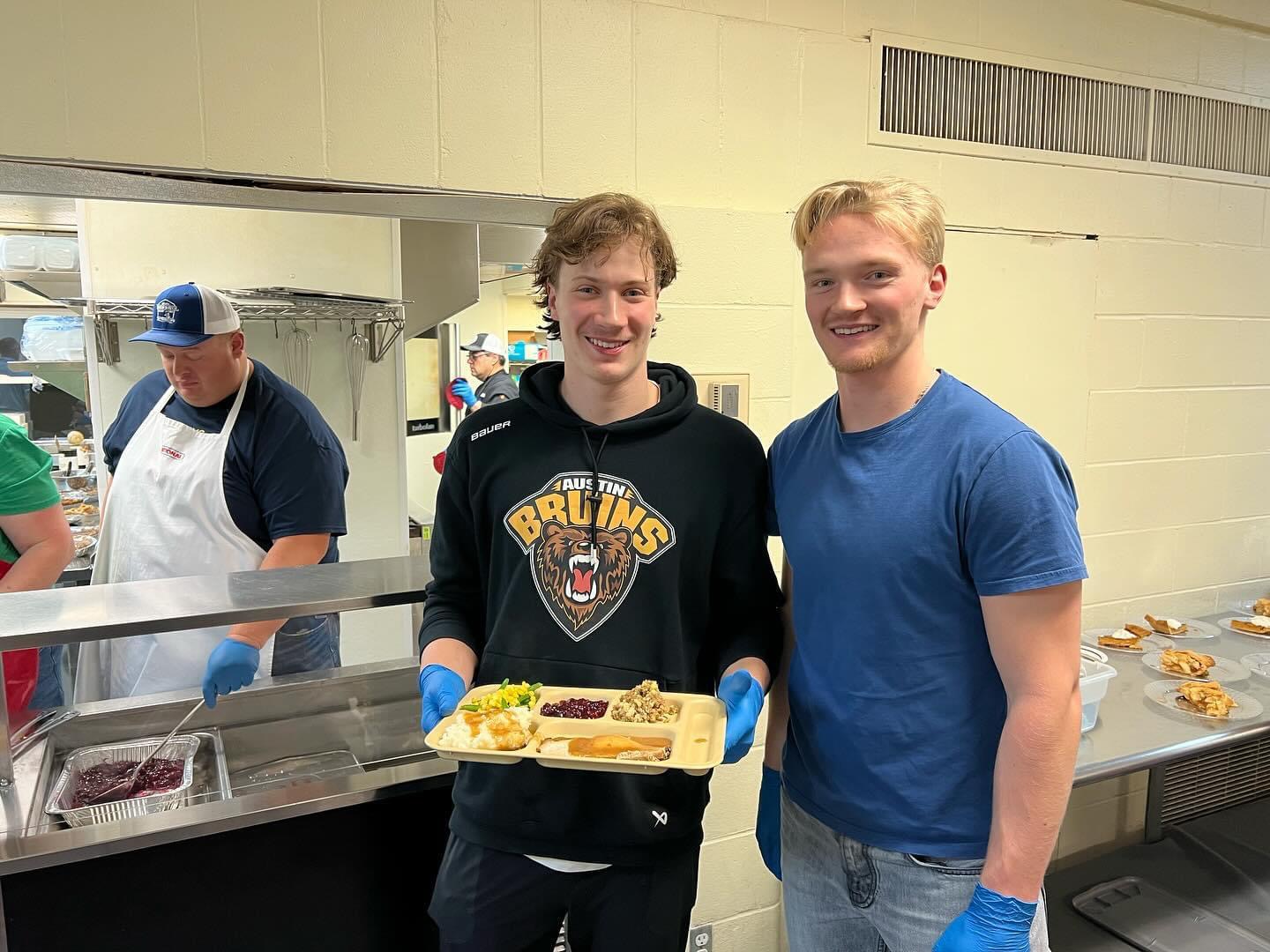 Austin Bruins players serving food at Salvation Army